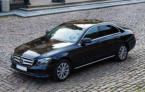 Mercedes E-Class parked on the road, representing Melbourne Airport Transfers Berwick