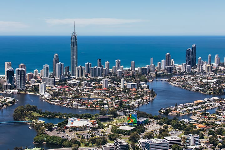 Scenic view of the Gold Coast with a luxurious vehicle highlighting our chauffeur service Gold Coast.